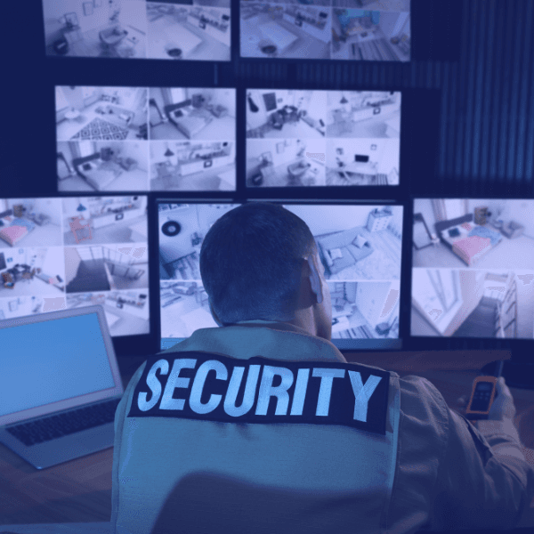 Security guard looking at video footage