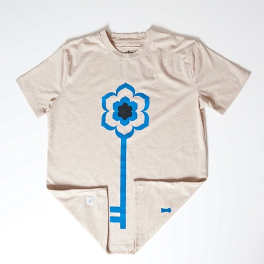 Tee design of flower key logo