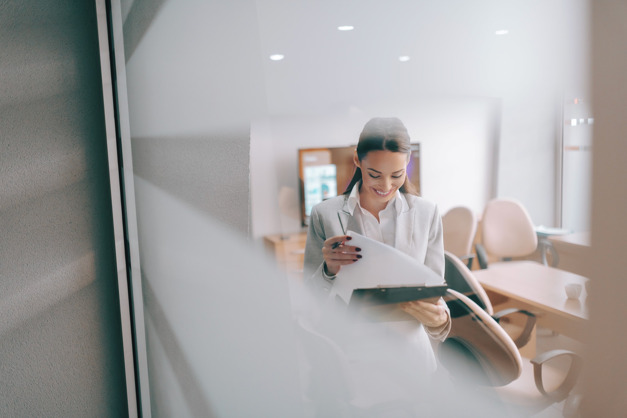 man drawing on dry-erase board