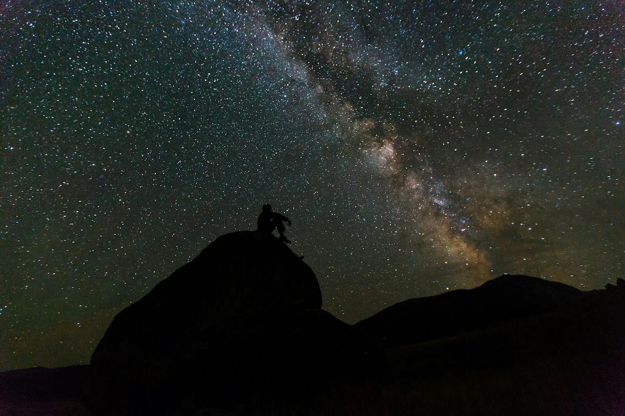 person stargazing