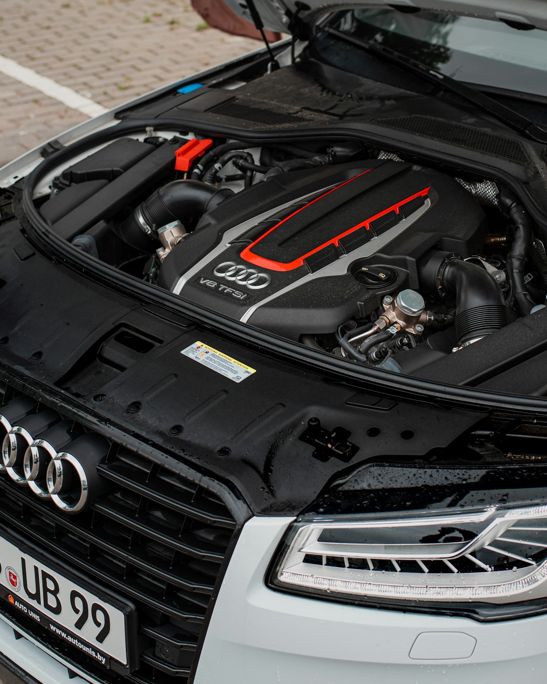 Car repair website SEO article cover showing an auto engine inspection for local auto shop services