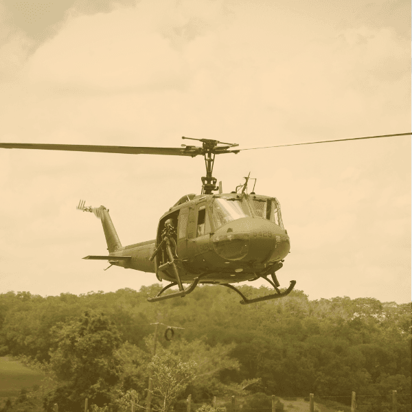 Military helicopter flyomh in the sky