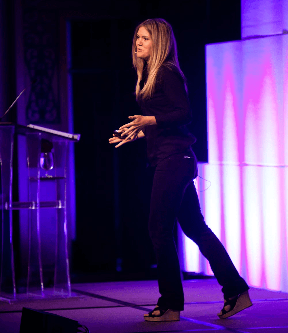 person sitting in a chair in front of a man