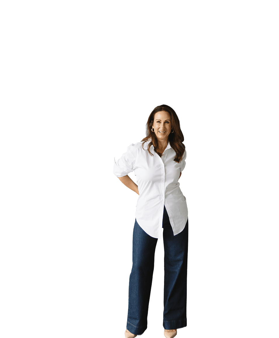 Stacy confidentially standing with her hands on her hips.