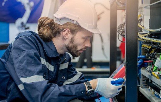 Technician performing hands-on server maintenance and IT repairs, nDataStor proactive support