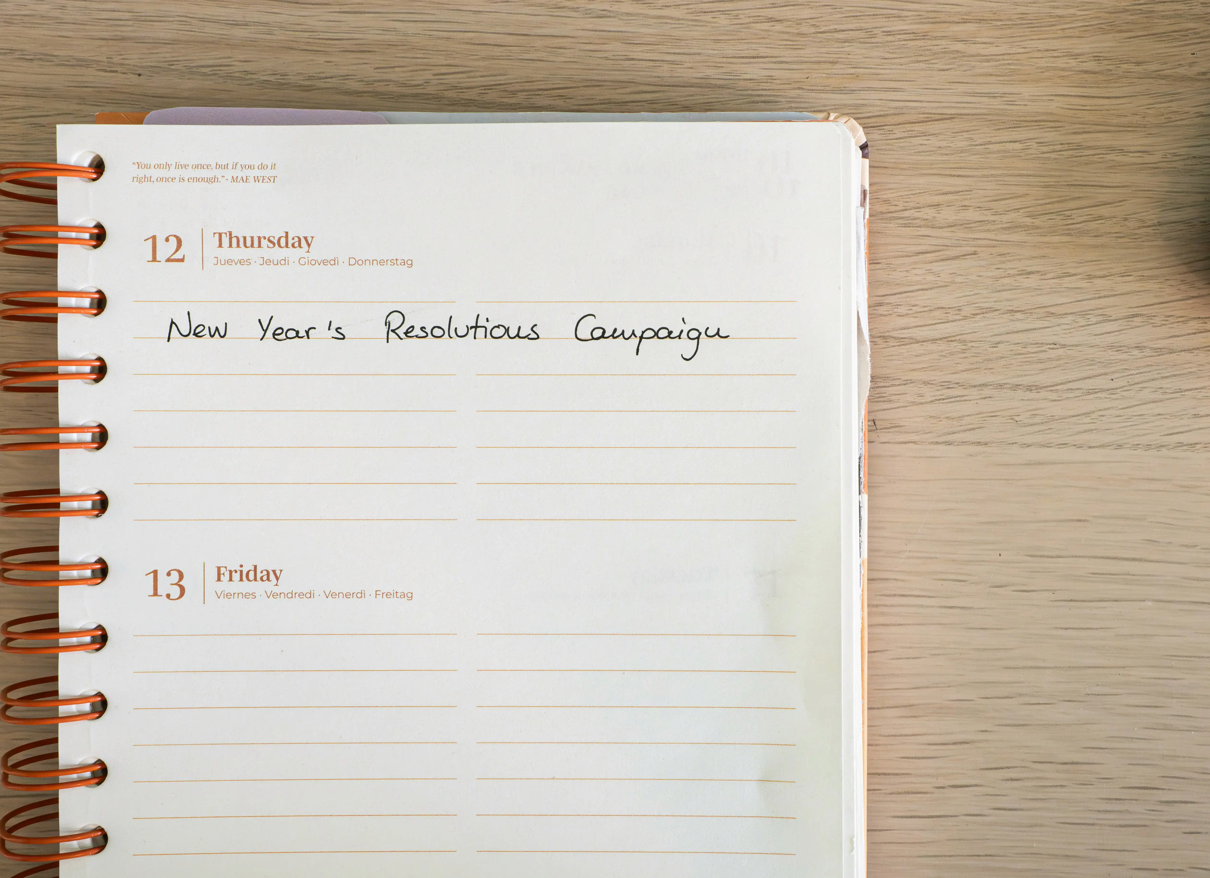 a notepad with the words new year's resolution campaign written on it