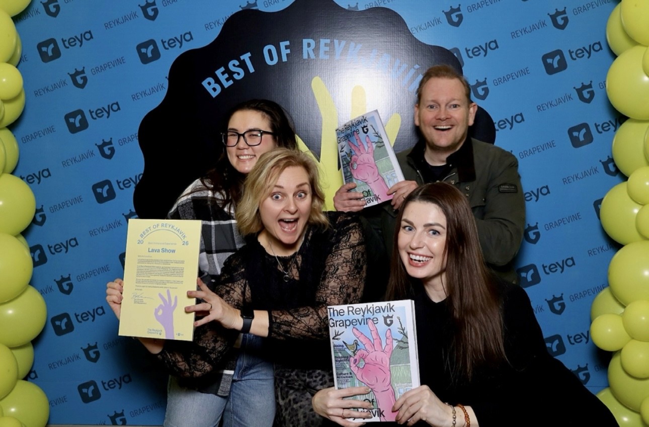 Lava Show team members pose at the Reykjavík Grapevine Best of Reykjavík awards, holding the Best Immersive Experience 2026 certificate and Grapevine magazines. From back left: Madison MacKenzie, Operations Manager, and Jón Heiðar Ragnheiðarson, Sales and Marketing Manager. Front left: Ragnhildur Ágústsdóttir (Lady Lava), Founder, and Inga Inga Zaleckyte, Partner Manager.