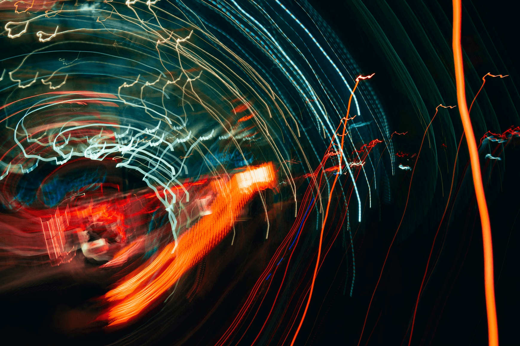 Abstract streaks of colorful light trails at night