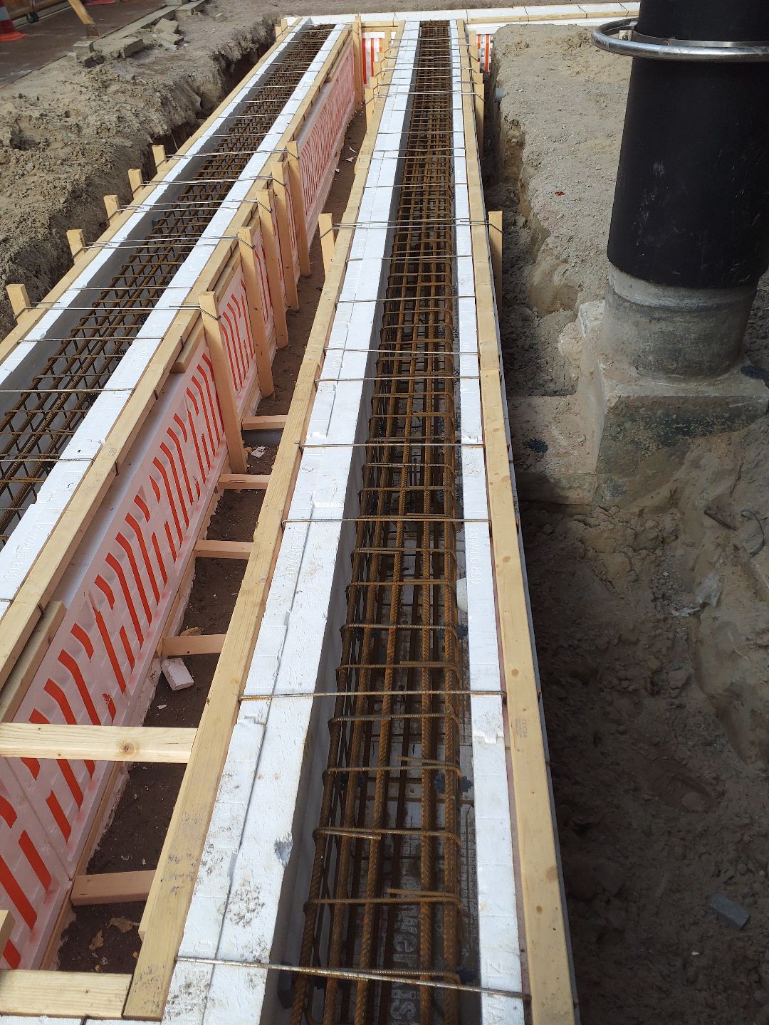 a room that is under construction with concrete walls