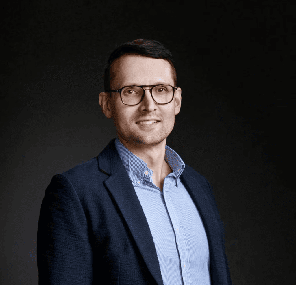 Group of men standing with Sufboard