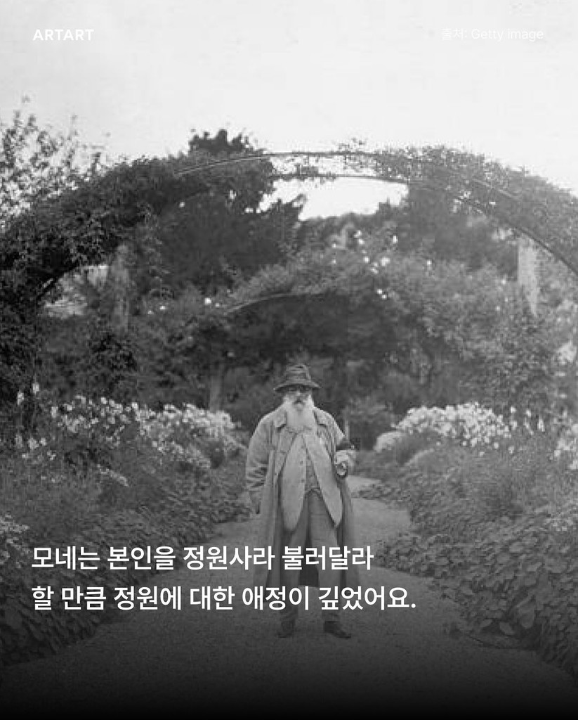Person shown from the back sitting behind a desk looking at a screen.