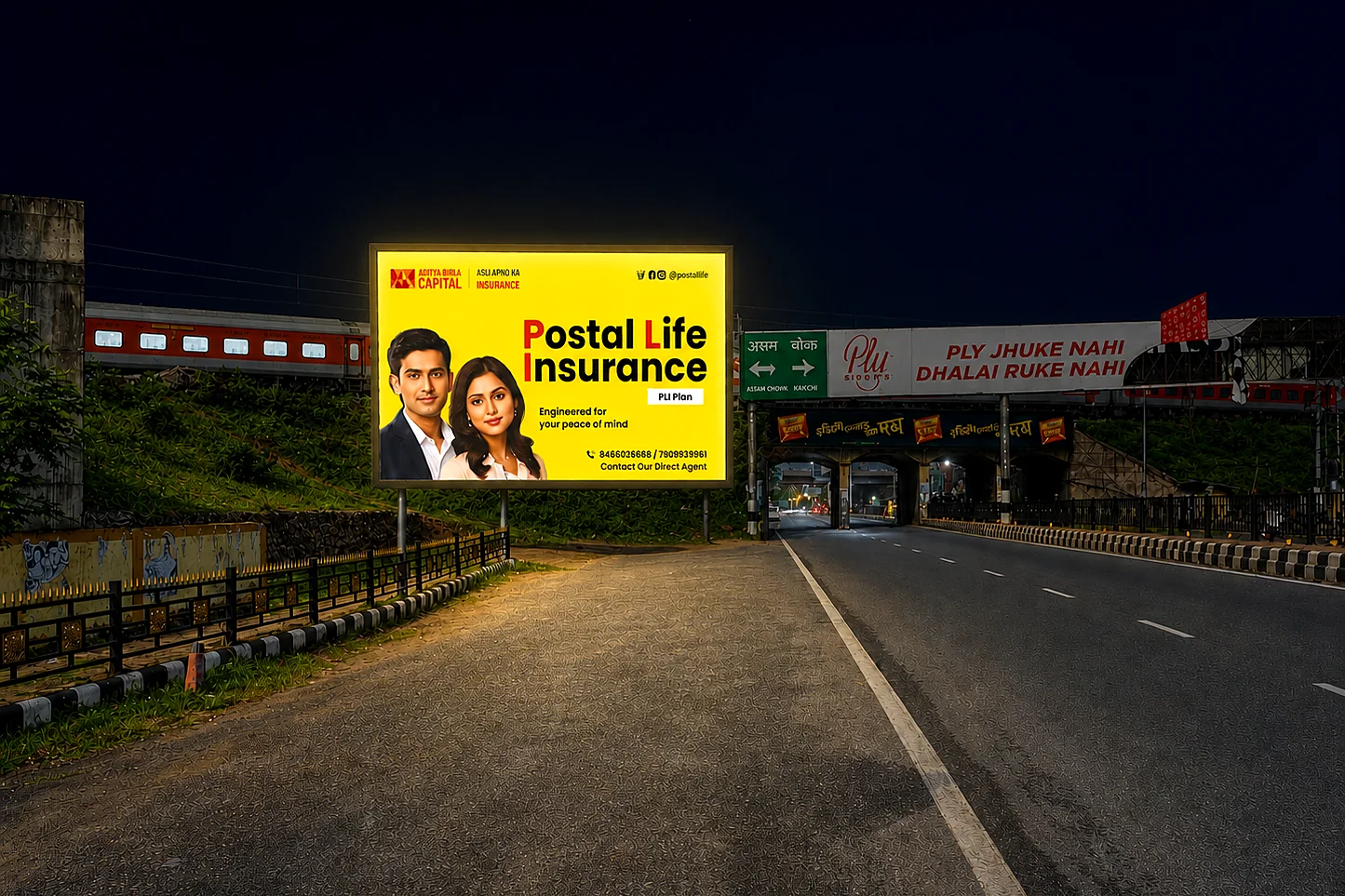 Postal Life Insurance hoarding at Jalukbari, night view