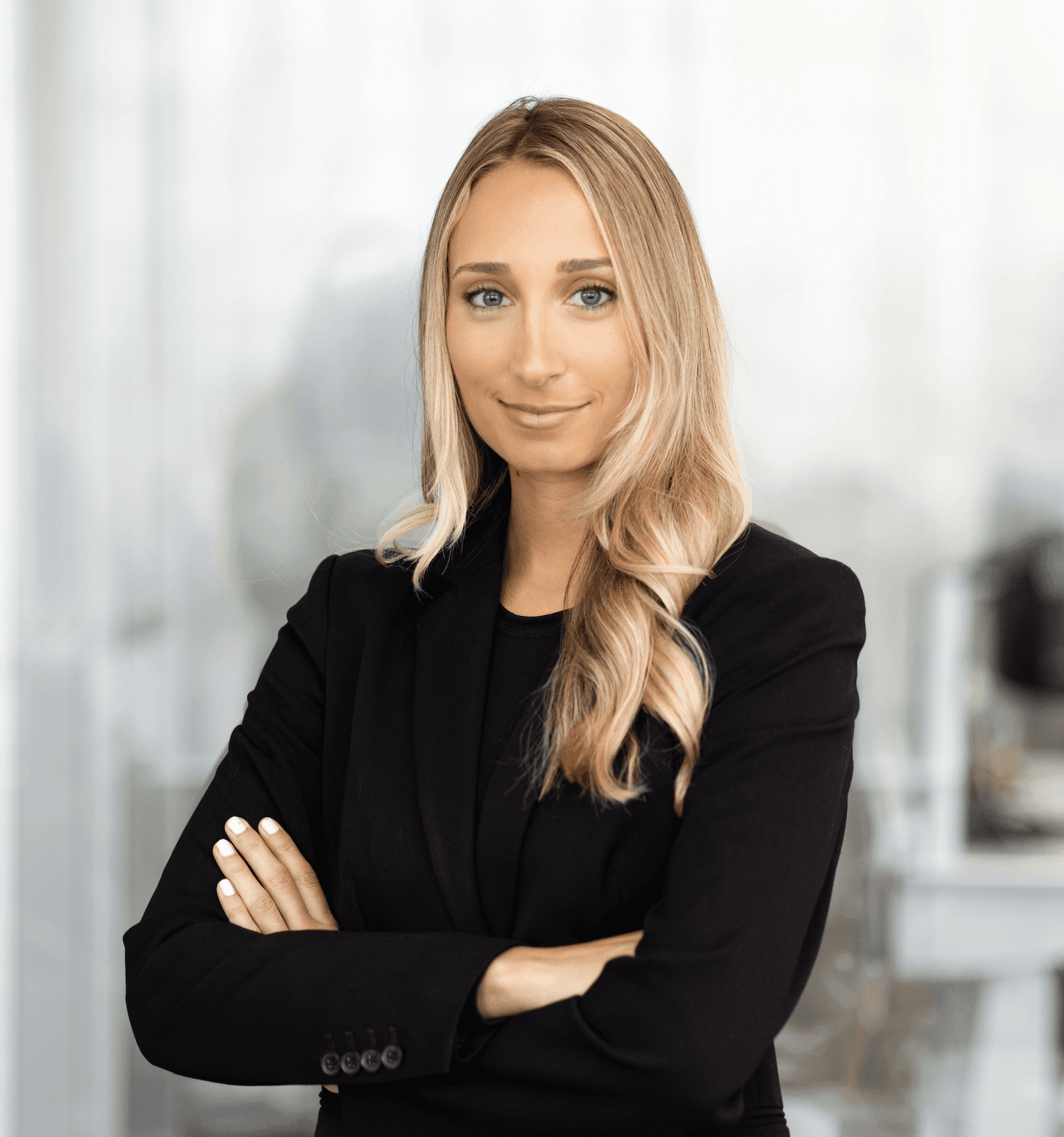 Gigi Grasska, a personal injury lawyer in a suit.