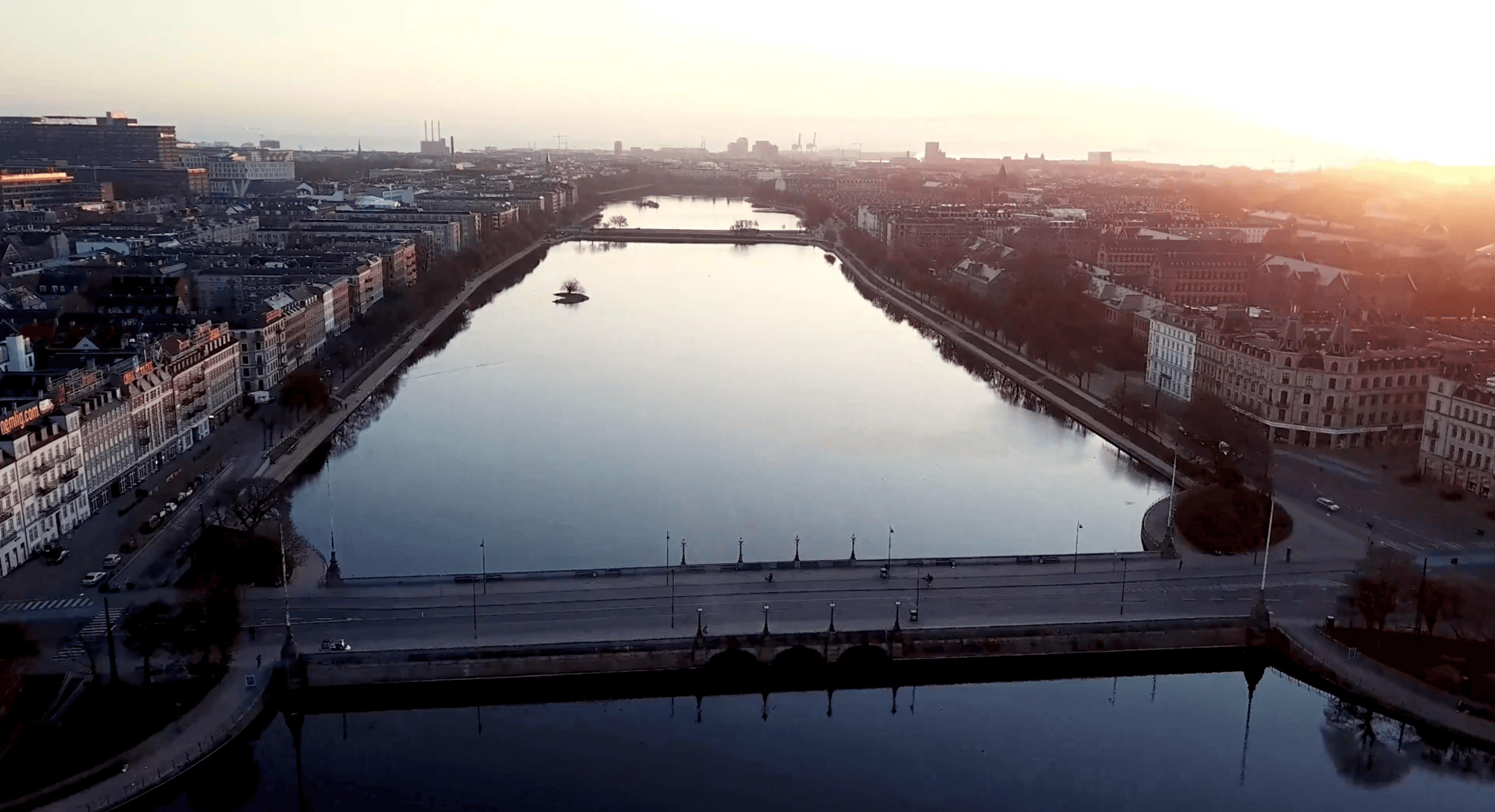 cars on road near buildings during daytime