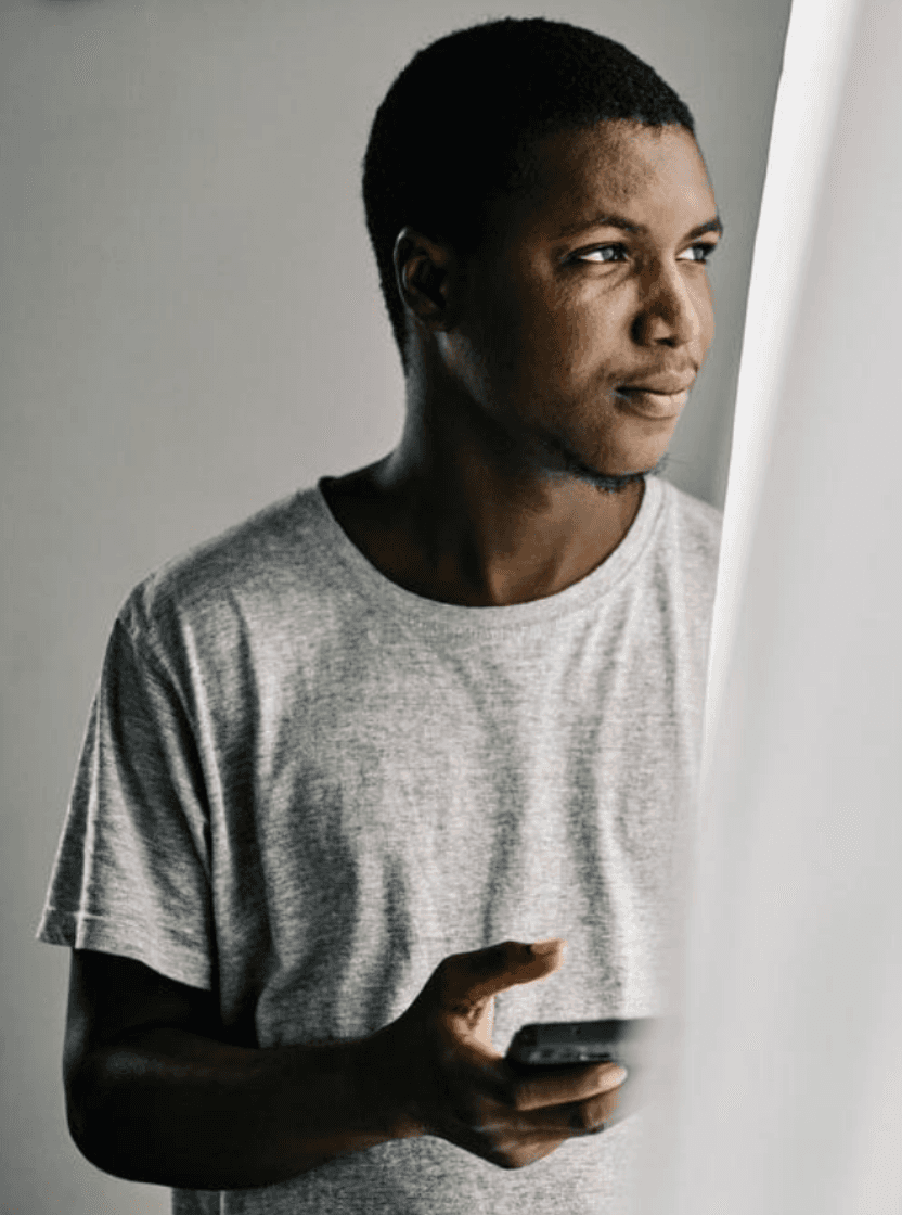 lady checking her phone and smiling