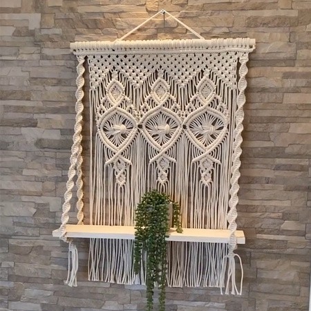 Handcrafted macrame wall hanging shelf with wooden plank