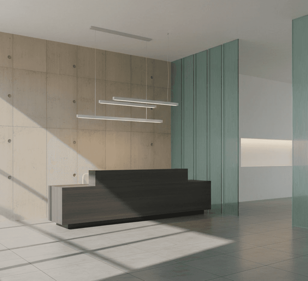 man wearing gray polo shirt beside dry-erase board