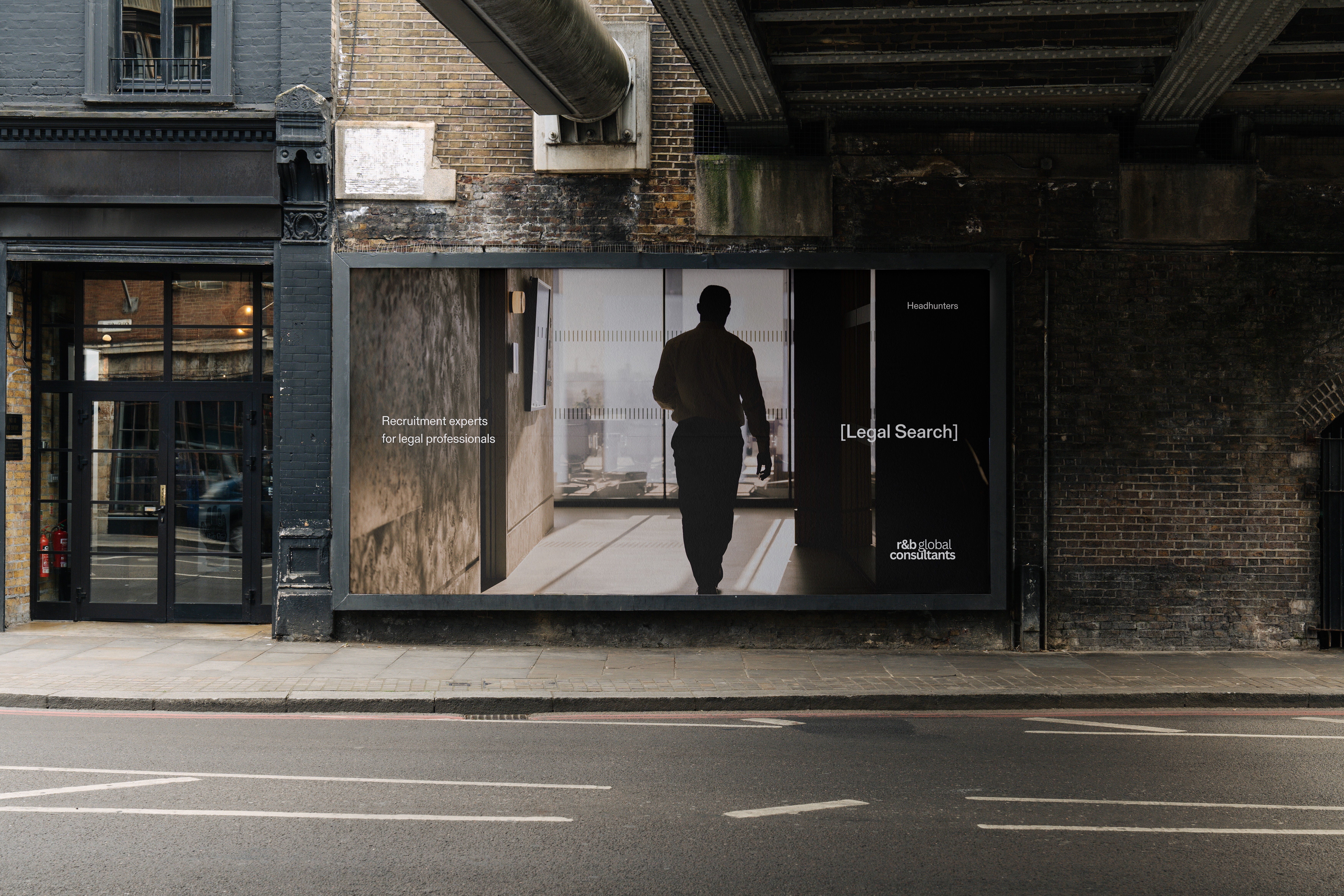 R & B Global Consultants legal recruitment billboard on a London city street