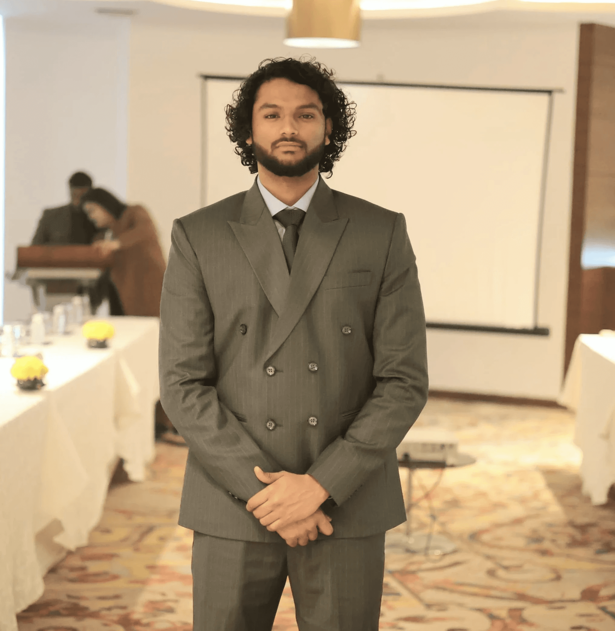 man wearing white V-neck shirt