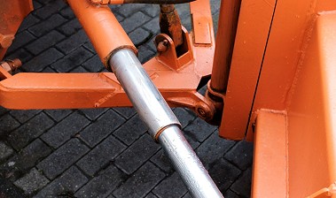 a couple of air conditioners sitting next to each other