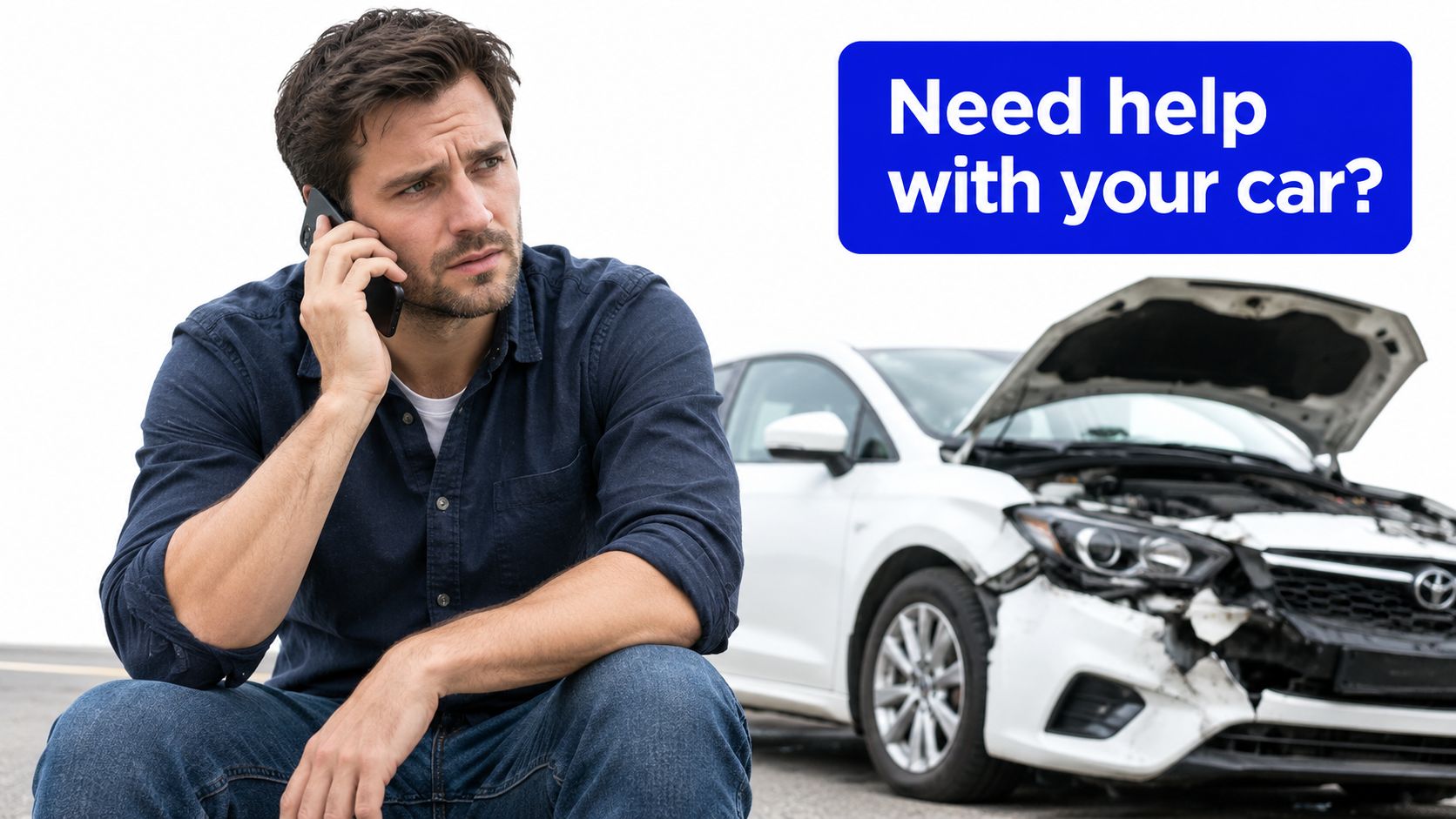 A man looking concerned while on the phone at the scene of a car accident, with his damaged vehicle in the background.
