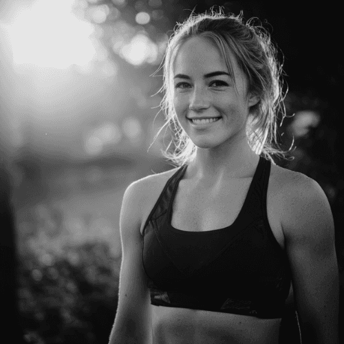 Sara is a client smiling to the camera happily