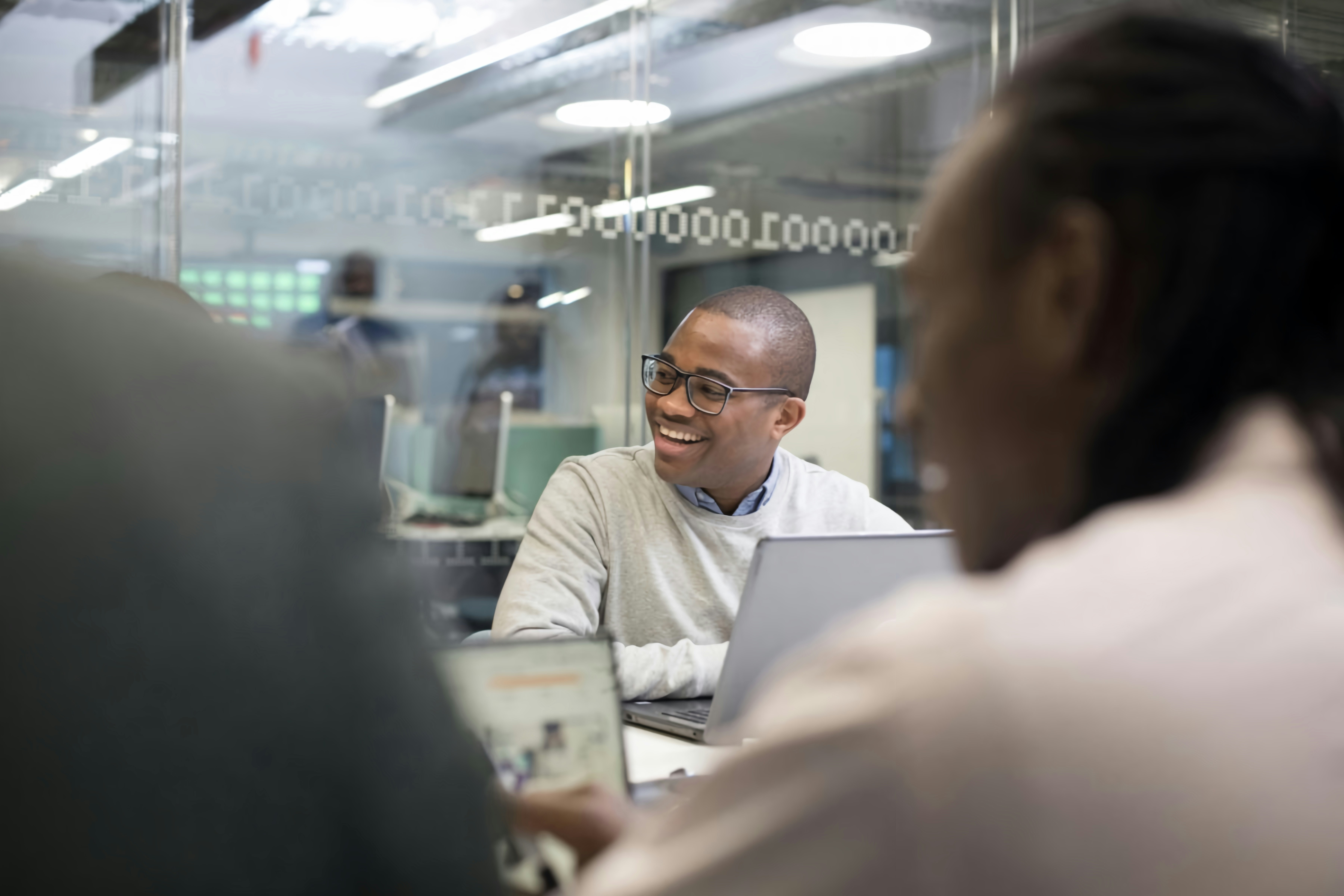 A meeting scene describes consultation