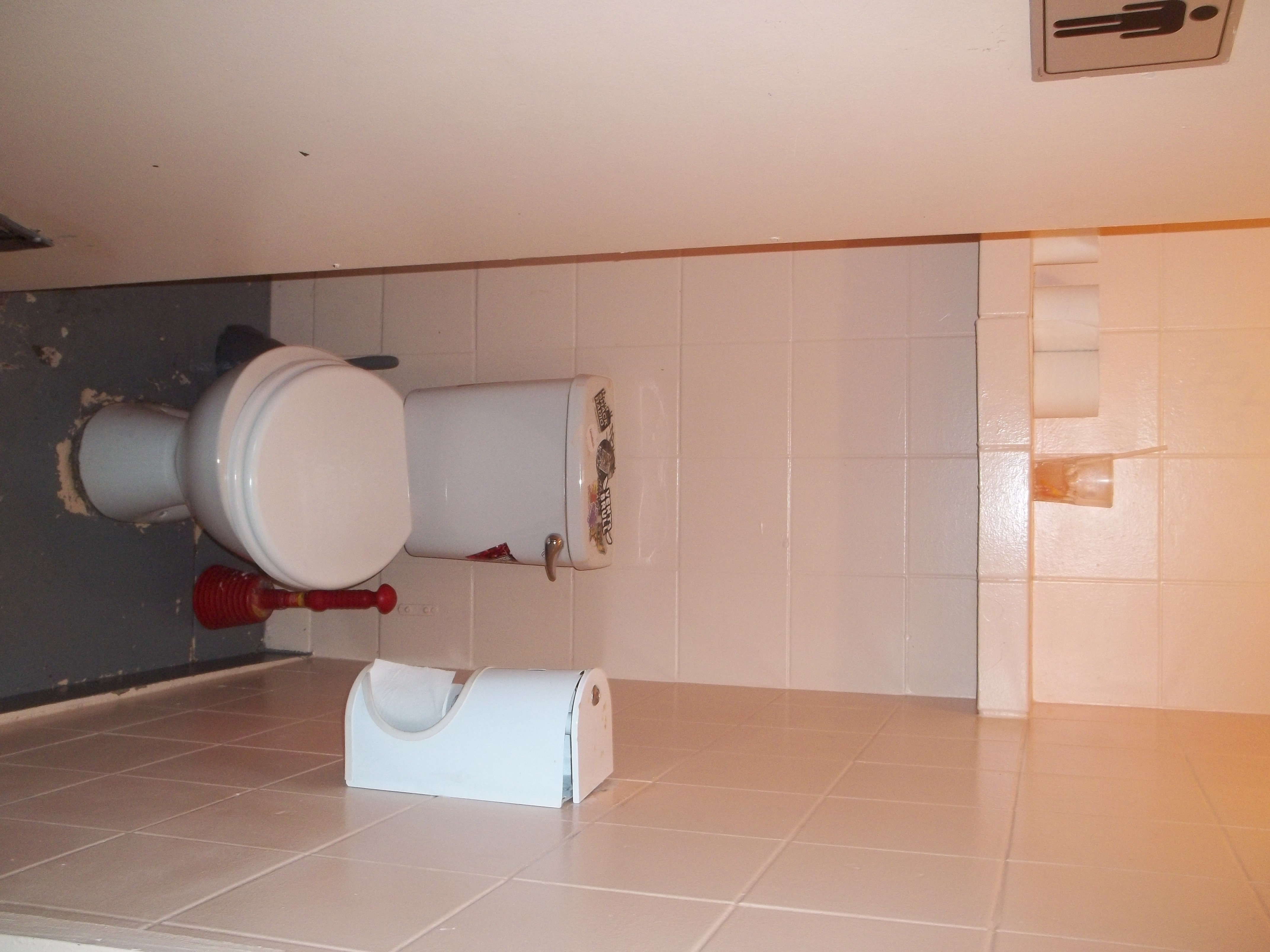 A group of people sitting around a living room