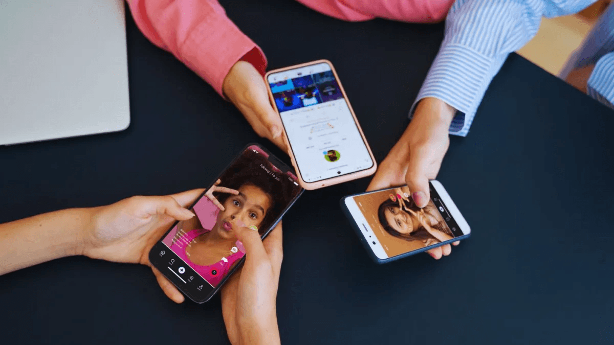 People holding smartphones showing social media - Short Social Media Videos