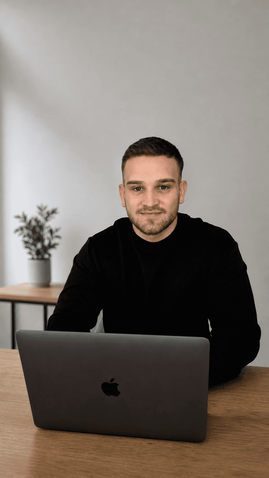 Man sitting by desk