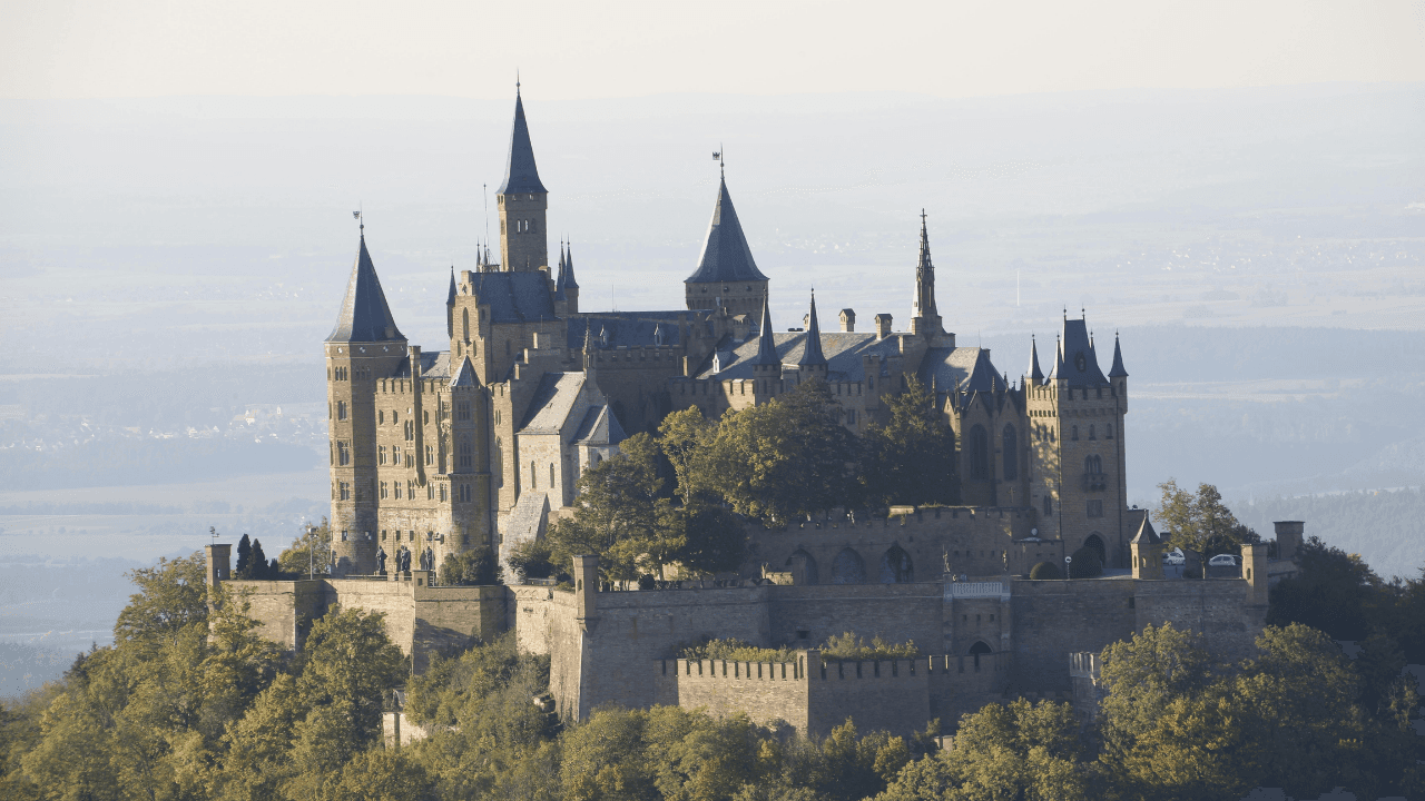 brown wooden boat on body of water during daytime