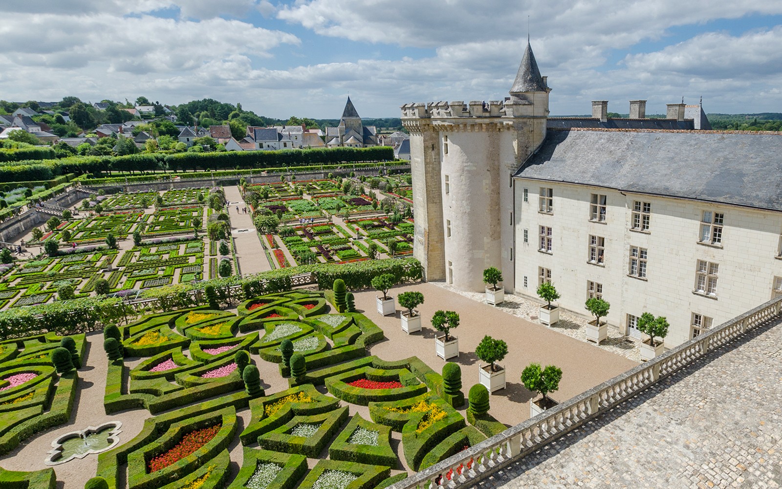 Aerial view of Chateau de Villandry gardens with intricate geometric patterns, France.