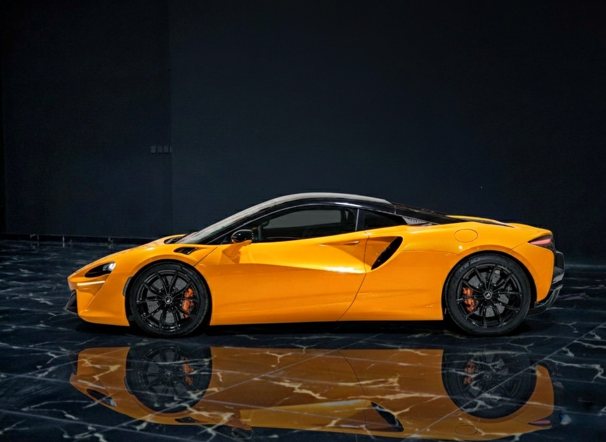 McLaren Artura 2024 orange hybrid supercar exterior detail photographed for Queen of Supercar Rental Dubai