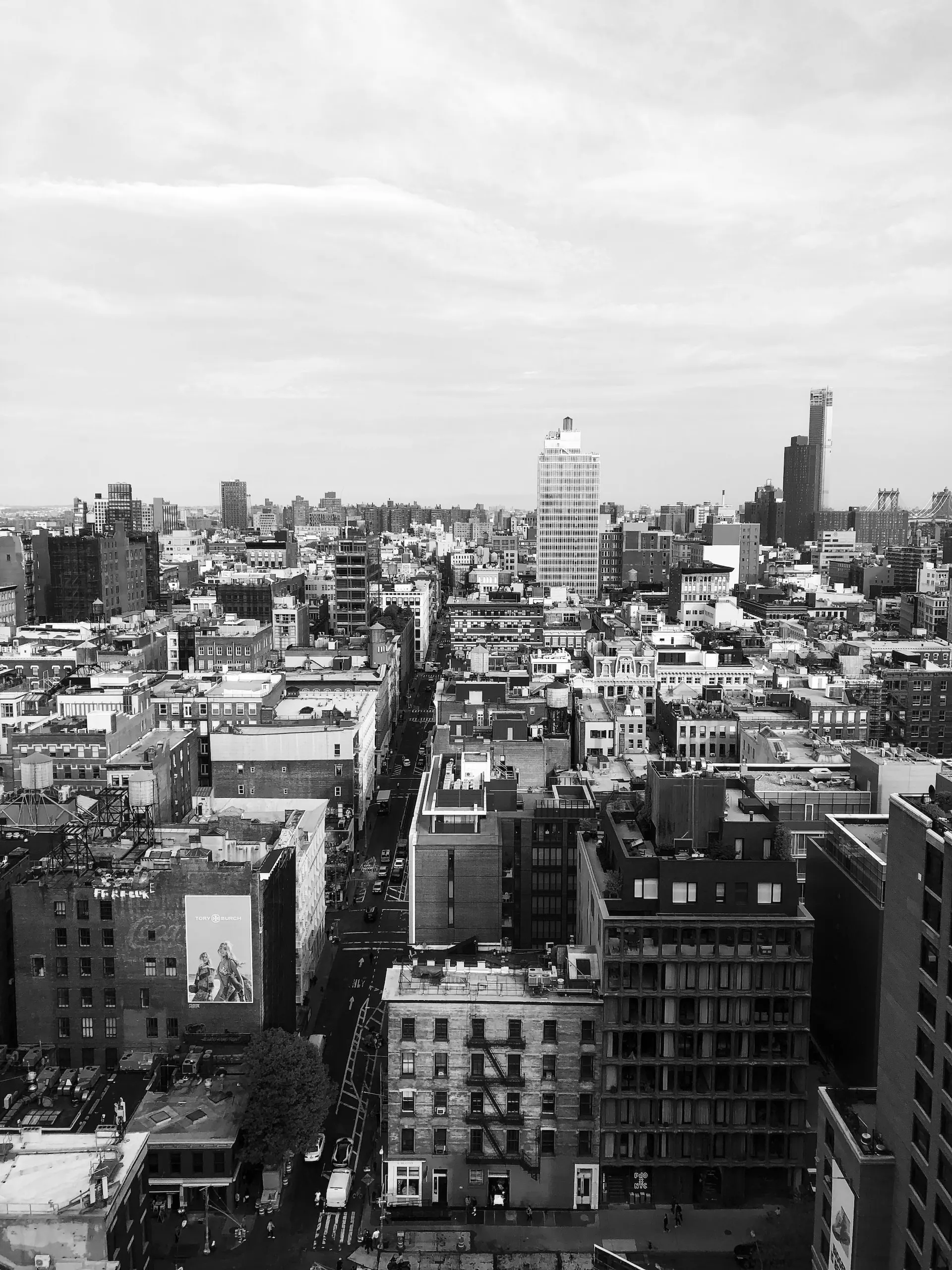 Greyscale photo of a cityscape.