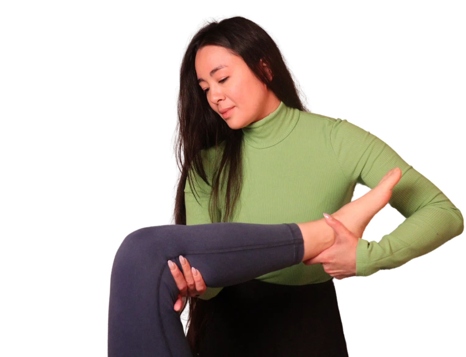 Osteopathic manual practitoner mobilizing a patient's leg