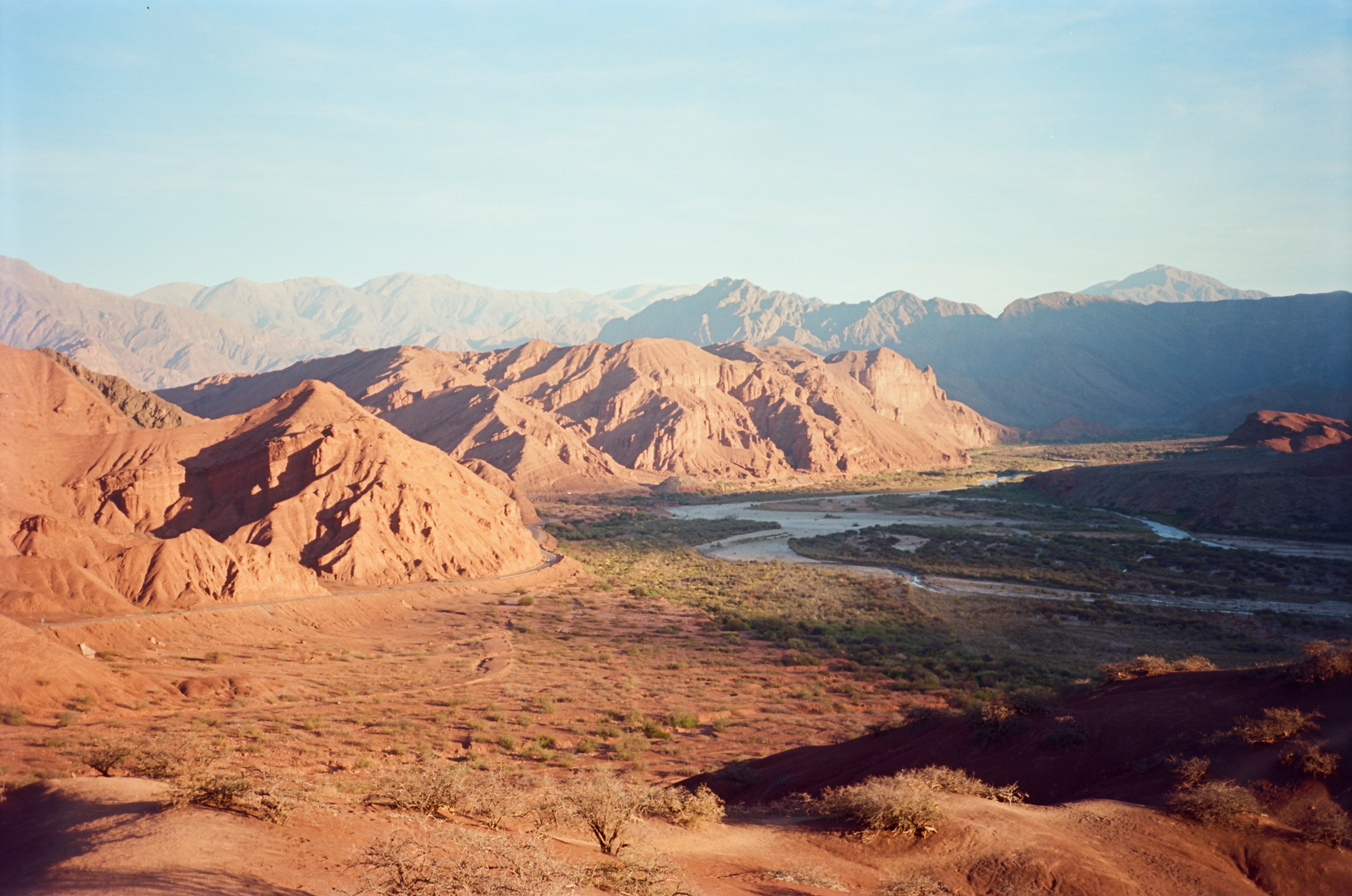 Desert cliffs in AlUla under warm sunlight.
