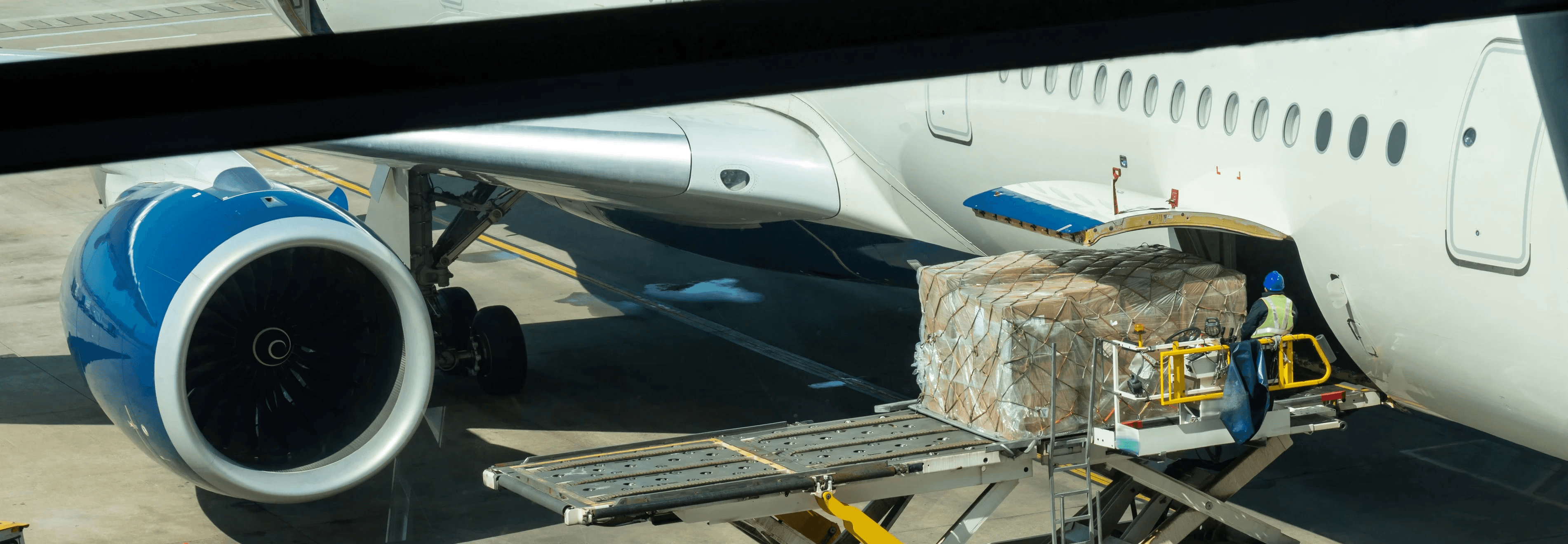 Scene of Loading luggage and cargo to airplane
