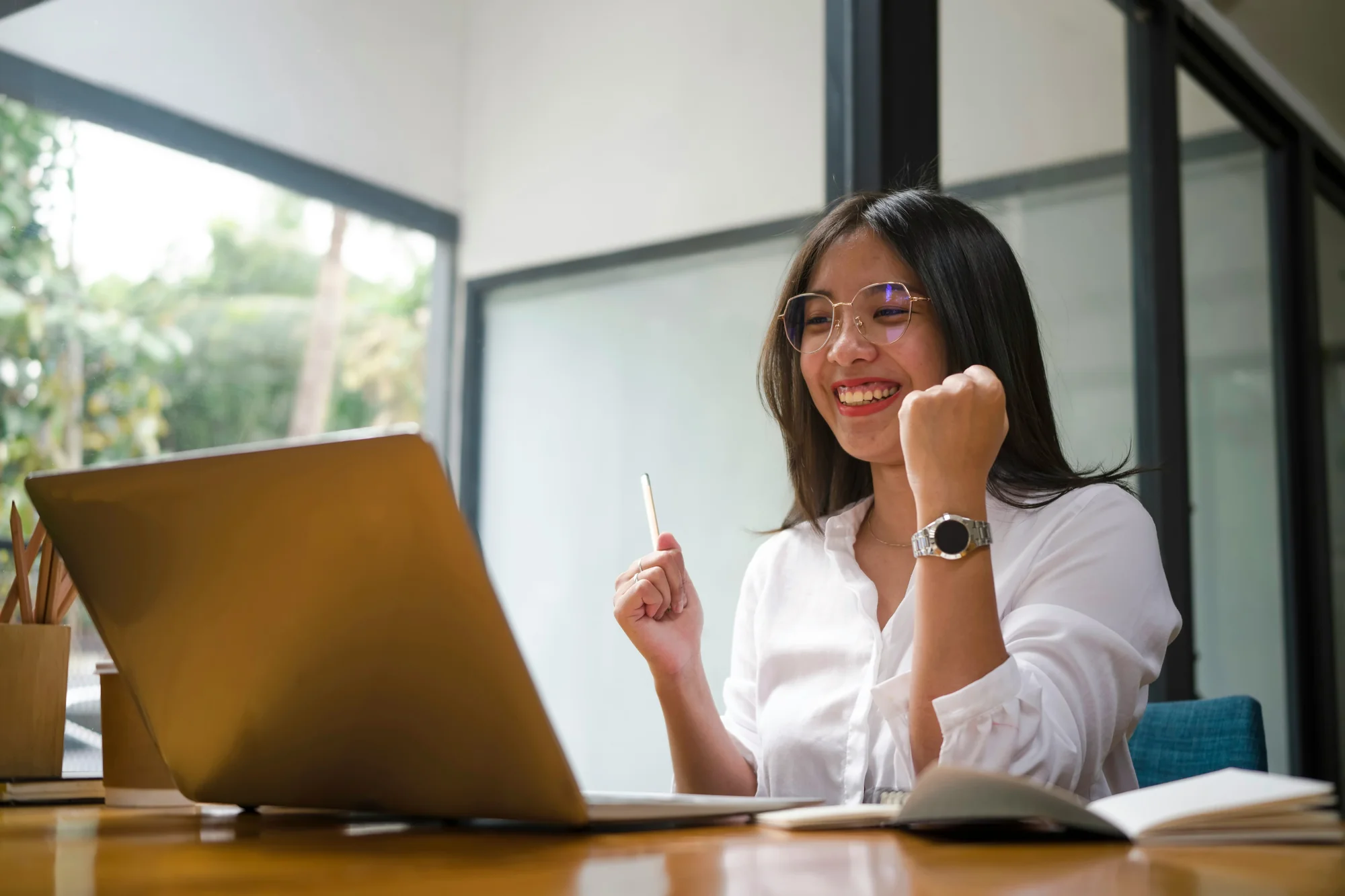 Zoom meeting with raise hand reaction button visible