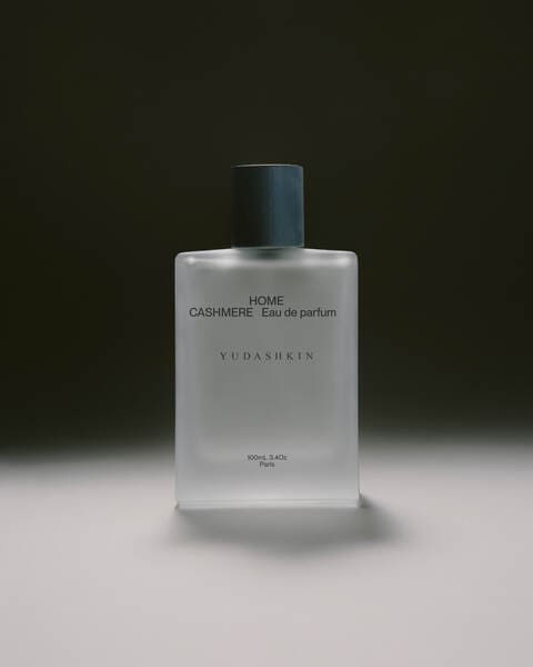A studio photo of a perfume bottle.