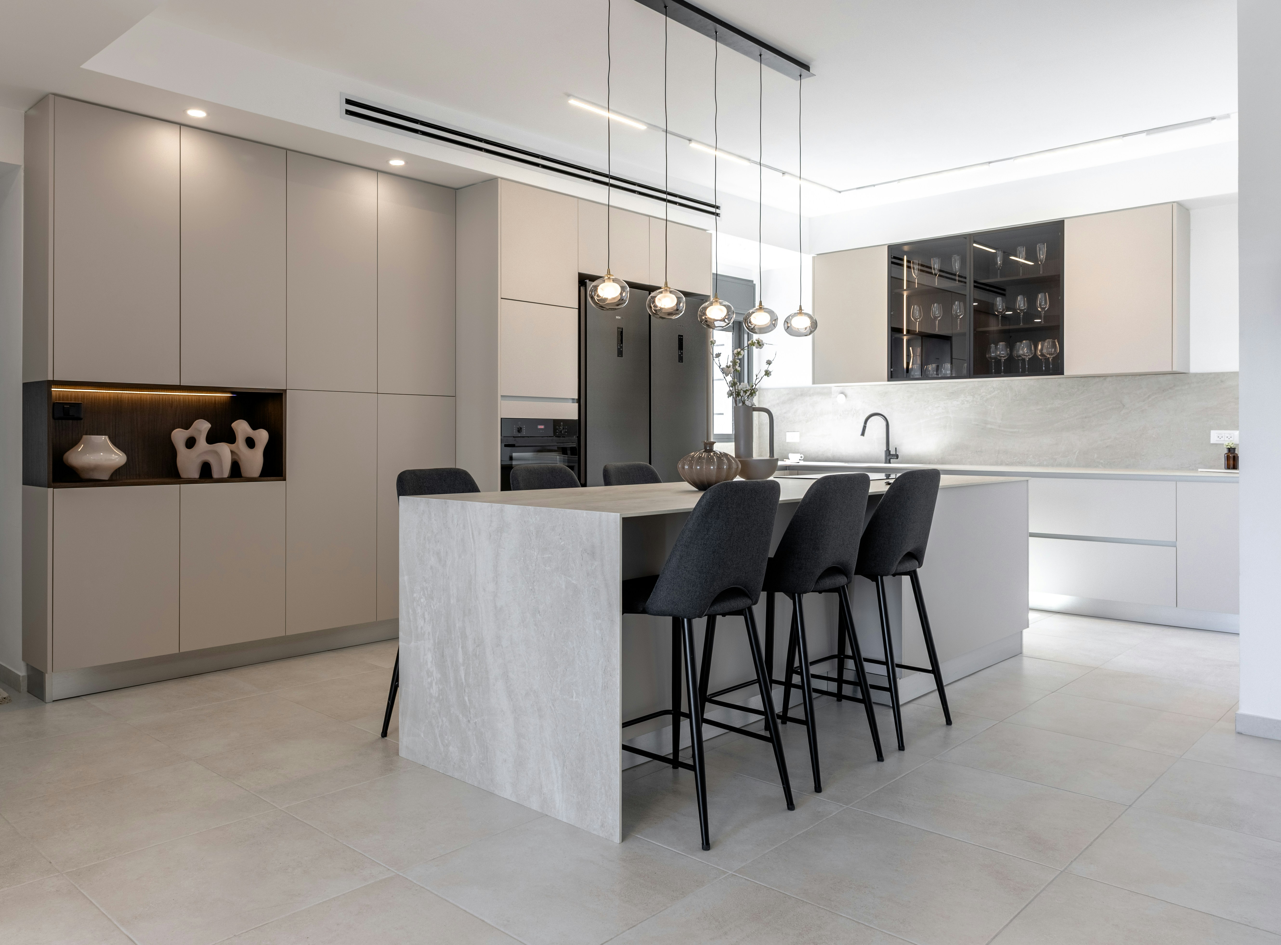 Modern kitchen with island and bar stools