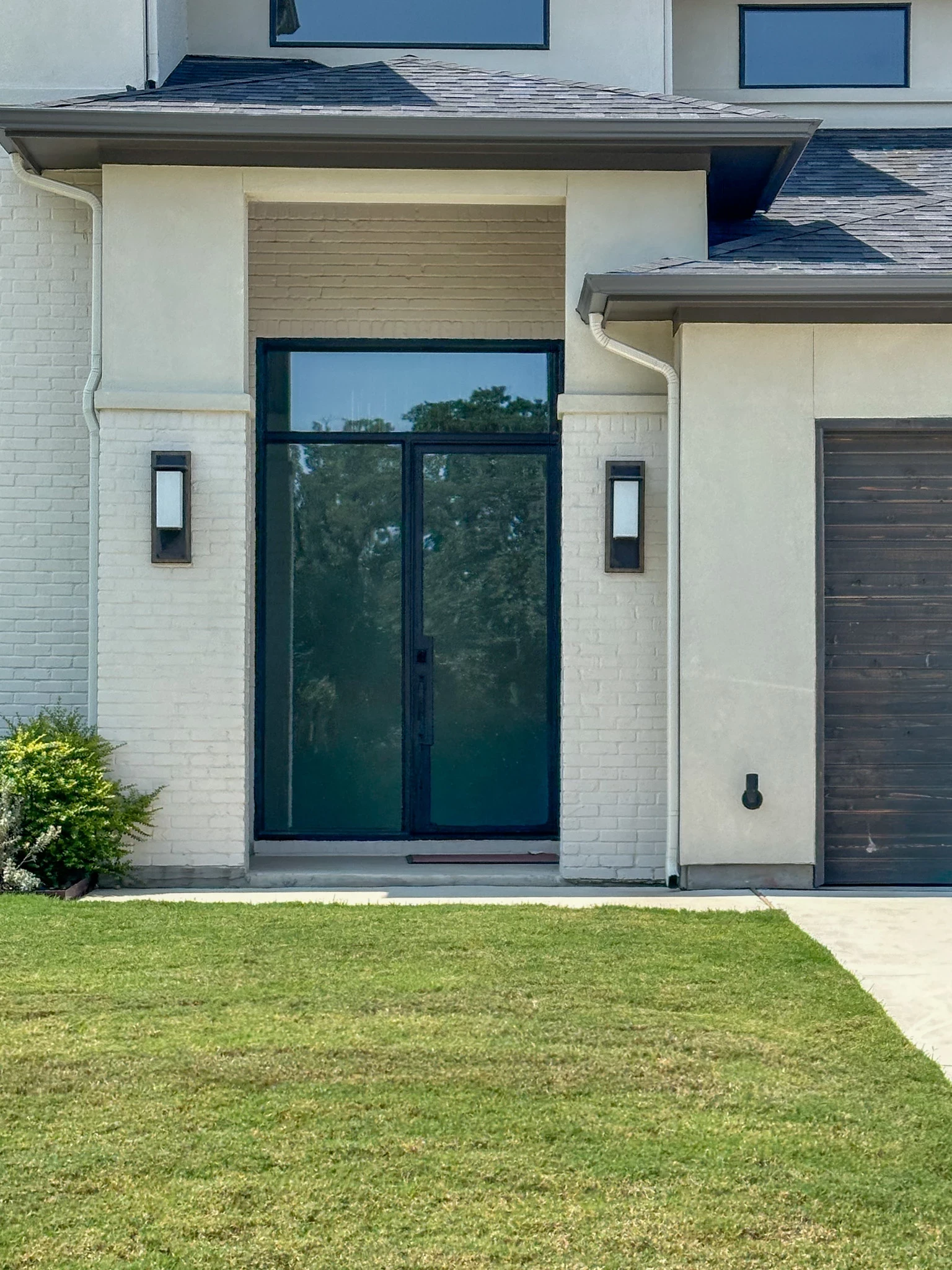 Traditional wrought iron double doors by M2 Metals Iron Doors DFW