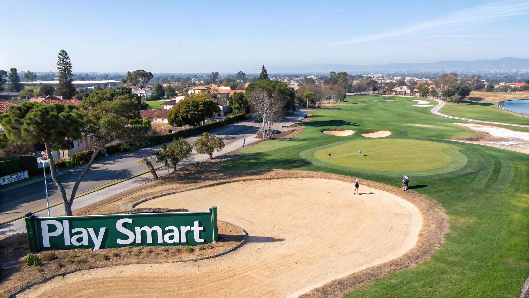Aerial view of Rancho Park Golf Course with a prominent 'Play Smart' sign and golfers on the green.
