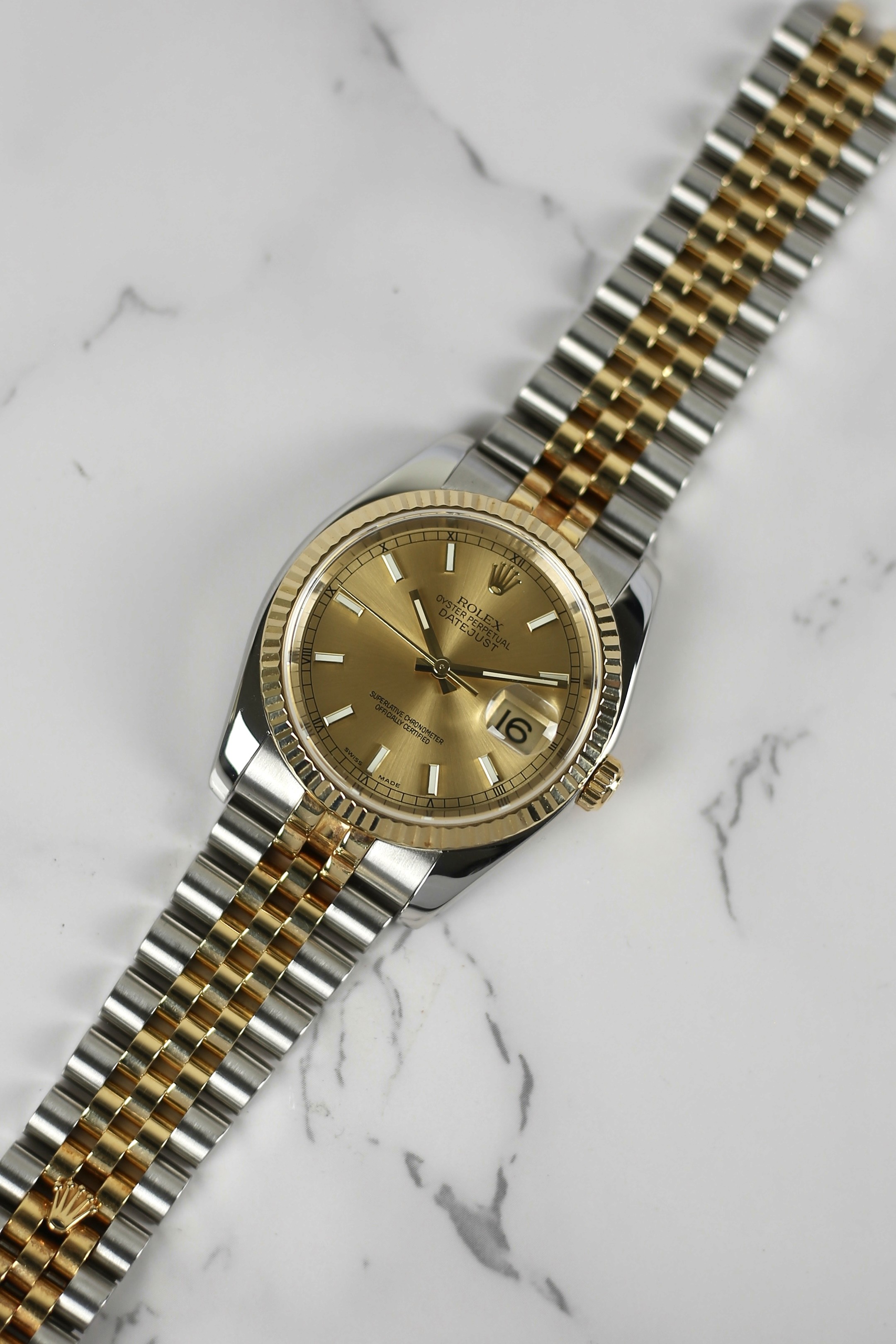 DATEJUST CHAMPAGNE INDEX HIDDEN CLASP 18K YELLOW GOLD BEZEL