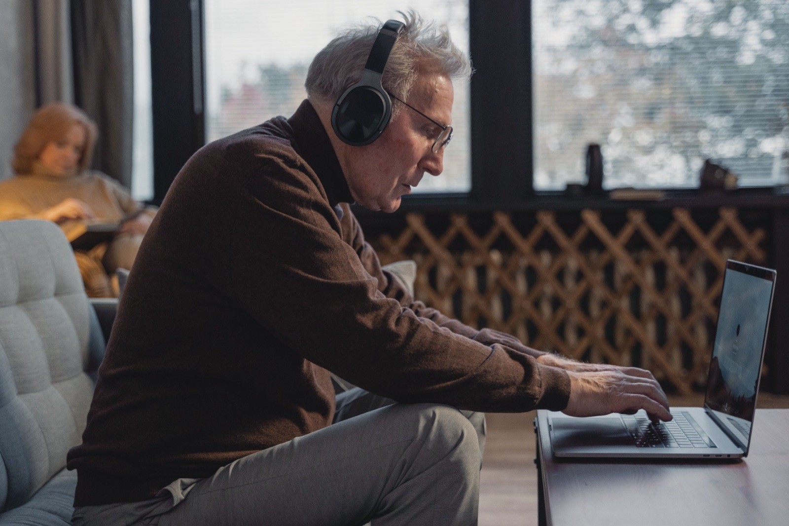 Participant taking part in an interview from home with headphones