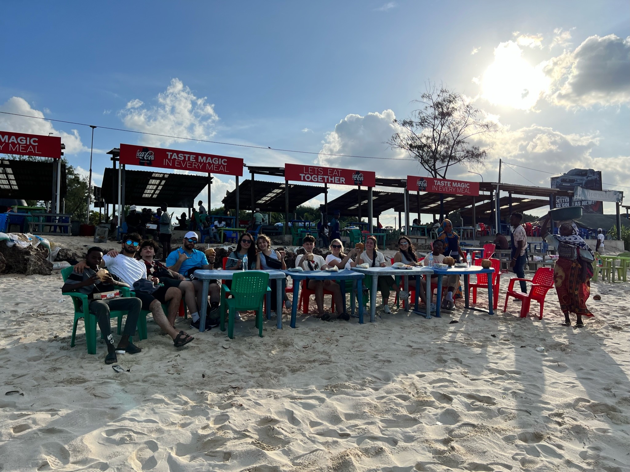 woman in black blazer smiling