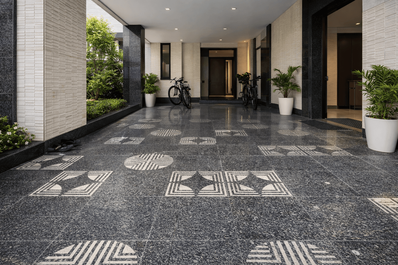 Decorative stone flooring with geometric patterns in residential entrance walkway