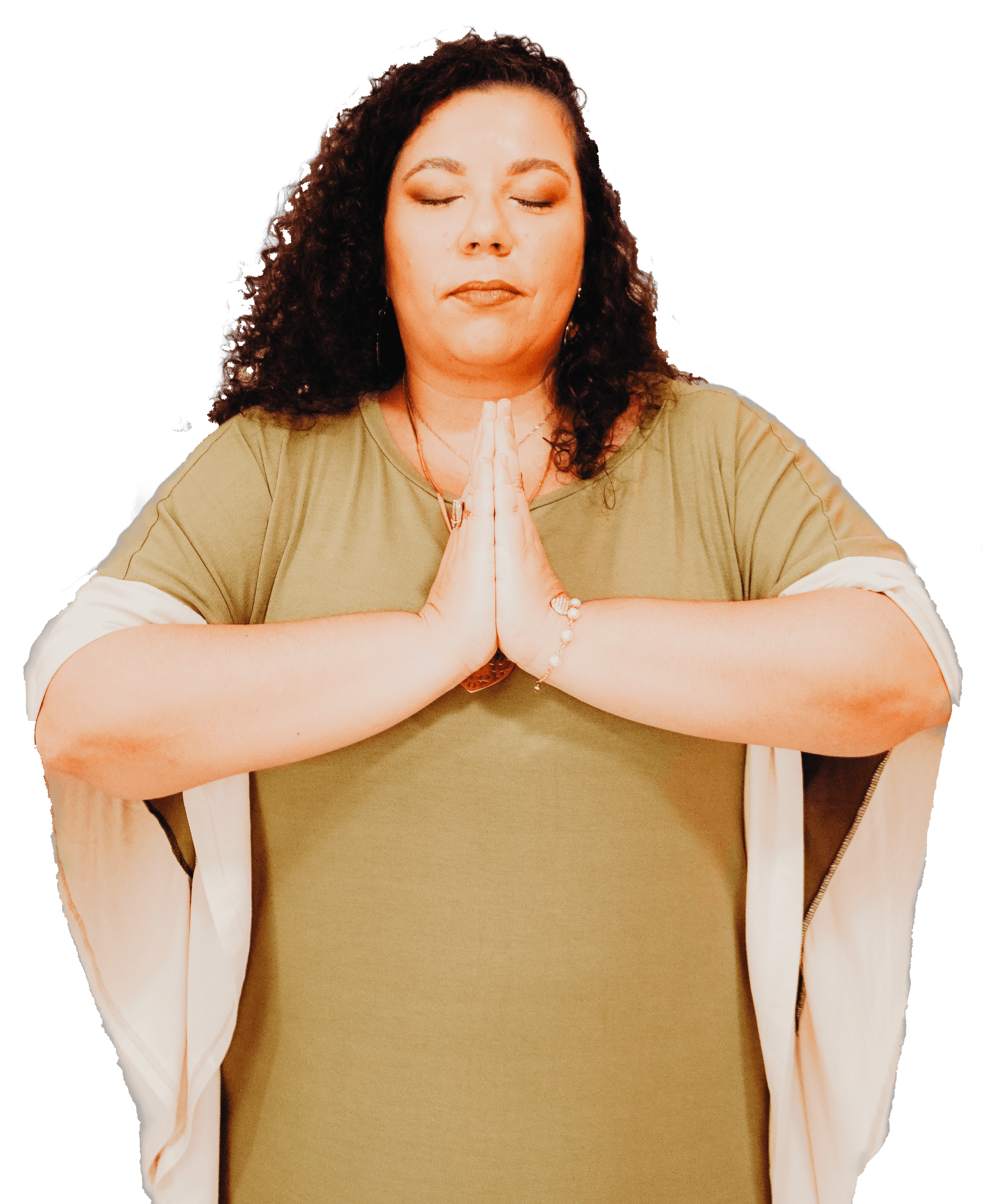A woman sits cross-legged with eyes closed, wearing a white blouse and a long purple skirt, looking serene.