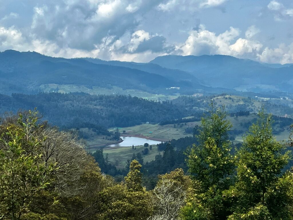 Mannavanur lake nestled in between the hills and forests.