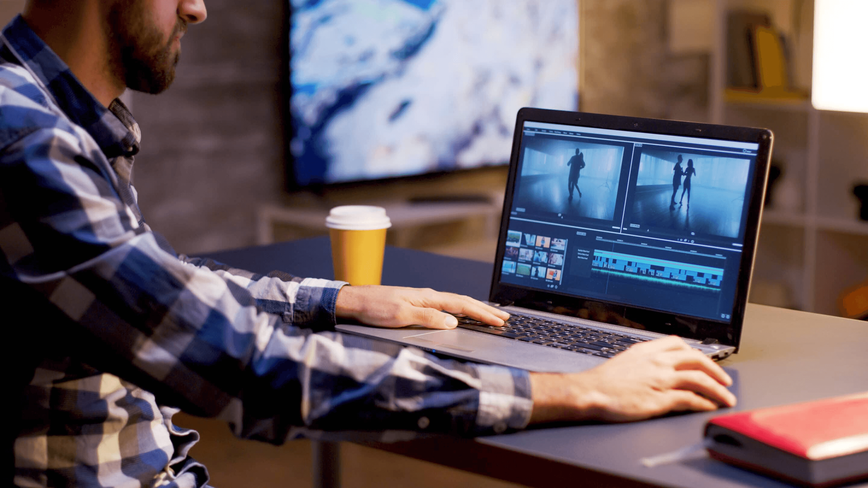 Man editing video on a laptop -  Short Form Video Production