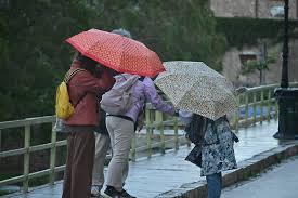Stormy conditions with powerful winds rain thunder and snow across Greece